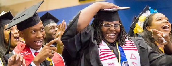 Happy graduates at ASP's Black Graduation ceremony.